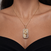 Gold necklace with a rectangular Virgo zodiac pendant featuring zodiac symbols