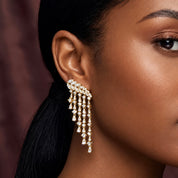 Model wearing Lumi Graduating Cascading Earrings in Gold | Valentina-Rose Jewellery