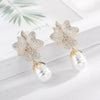 Gold earrings, pearl earrings, going out earrings, wedding earrings, golden earrings, drop earrings, party earrings, gold pearl earrings, pearl earrings, bridal earrings, statement earrings